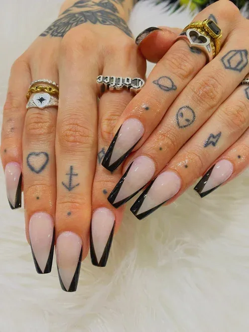 Black V-Tip nail art — long black French coffin nails