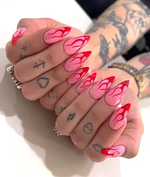 Flame French nail art — pink nails with red flame French tips